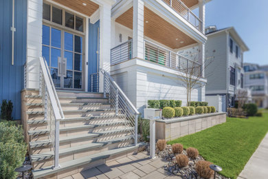 This is an example of a coastal porch design in Philadelphia.