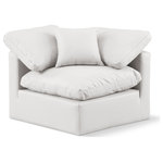 Meridian Furniture - Indulge Upholstered Modular Chair, Cream, Fiber Stuffed Vegan Leather, Corner Chair - Experience ultimate comfort and style with our cream vegan leather Indulge Corner Chair. The luxurious vegan leather will elevate the aesthetic of any room. This chair provides ample space for you to relax while its modular build offers the option of unlimited configurations. Whether you're looking to add a stylish element to your living room or a comfortable seating option to your bedroom, this chair is the perfect choice.