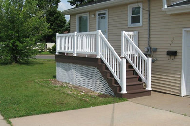 Entryway - entryway idea in Other with a white front door