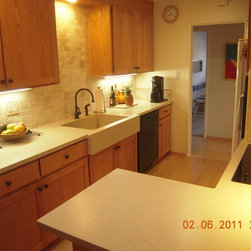 Corian Kitchen Using the Color Concrete with Tile Backsplash - Kitchen Countertops
