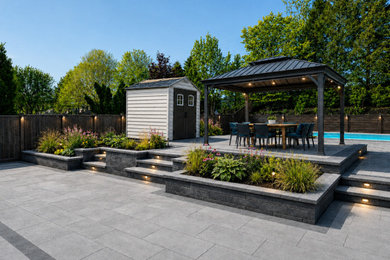 Patio - contemporary patio idea in Toronto
