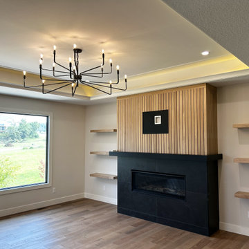 Maple Pecan Stain and Painted Black Kitchen Design in Bettendorf, Iowa