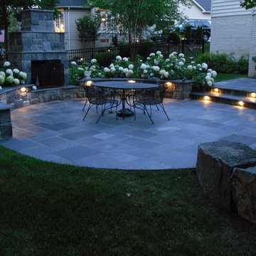 Lighted slate patio with fireplace - Ashburn, VA
