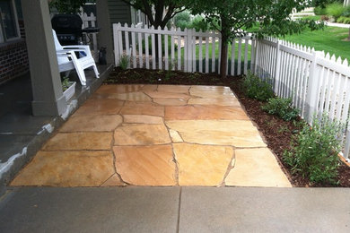 Example of a mountain style patio design in Denver