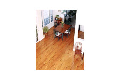 Photo of a country kitchen in Boston with medium hardwood flooring.