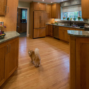 Warm Wood Kitchen Remodel | Natural Cherry Cabinetry, Granite Surfaces