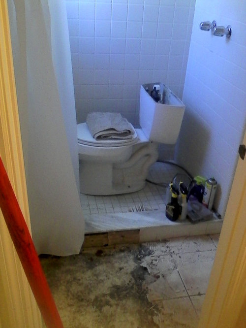 Replacing bathroom tile floor