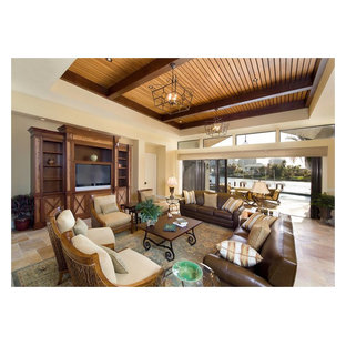 This is an example of a large mediterranean living room in Miami with beige walls and a built-in media unit.