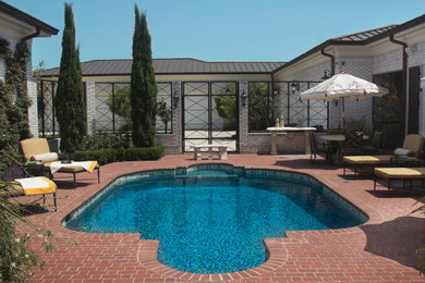 Transitional pool photo in Austin