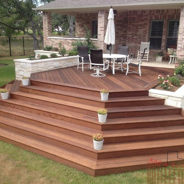 Ipe Hardwood Decking with Metal Framing, Limestone Flower Beds around Deck
