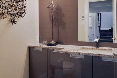 Inspiration for a contemporary powder room remodel in Toronto