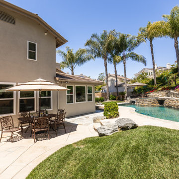 Outdoor Dining Patio Overlooking Custom Pool