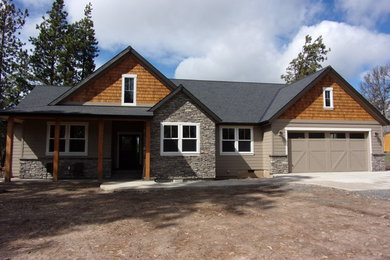 Example of an arts and crafts exterior home design in Portland