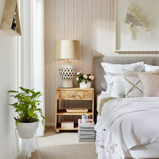 Inspiration for a transitional bedroom in Melbourne with beige walls and carpet.