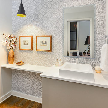 Half bath with mosaic tile wall