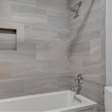 Modern Gray Master Suite and Guest Bathroom in Green Valley