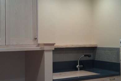 Laundry room - contemporary laundry room idea in Seattle