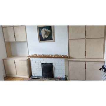 Birch ply alcove cabinets with extending desk.