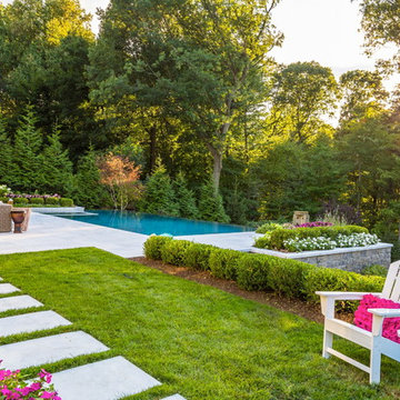 Luxury vanishing edge swimming pool and outdoor living area Ridgewood NJ