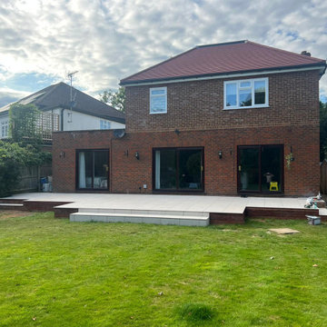 Completed family house extension with a newly paved terrace