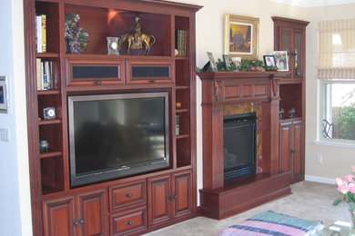 Small elegant open concept family room photo in Sacramento with beige walls, a standard fireplace, a tile fireplace and a media wall