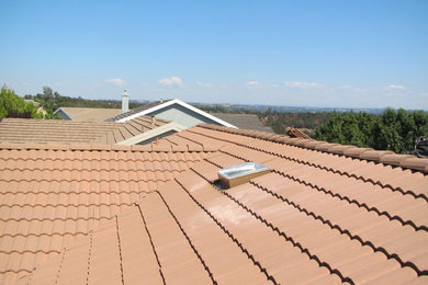 Sun Glo solar tube on a corrugated tile roof