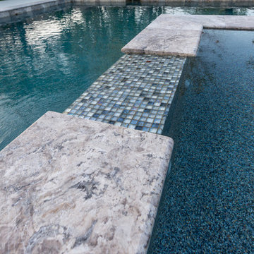 Spa Spillover with Tiles and Travertine