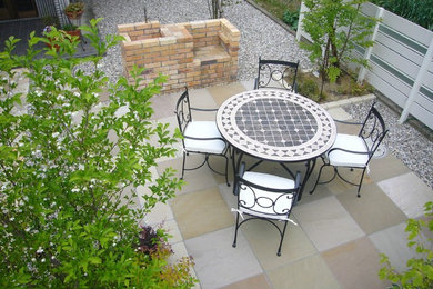This is an example of a country patio in Other.