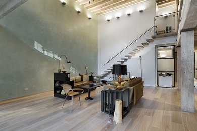 Living room - industrial living room idea in New York