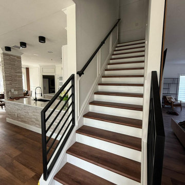 **Complete Kitchen, Flooring, Complete Stair Case and Trim