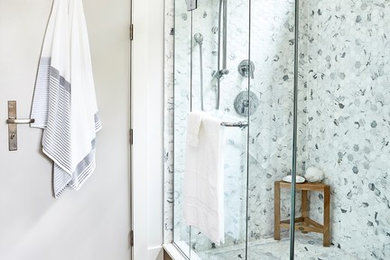 Inspiration for a contemporary master ceramic tile, gray tile and multicolored tile medium tone wood floor and brown floor corner shower remodel in Toronto with gray walls and a hinged shower door