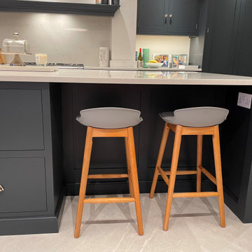 Modern monochrome handmade kitchen with full length larder
