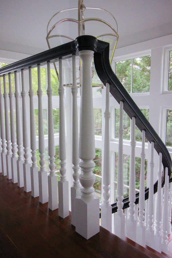 Powerful Impression by Floating Staircase in Suburban Foyer