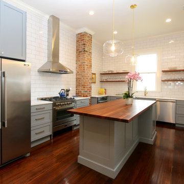 Open shelving and exposed brick are among the many details that encompass the si
