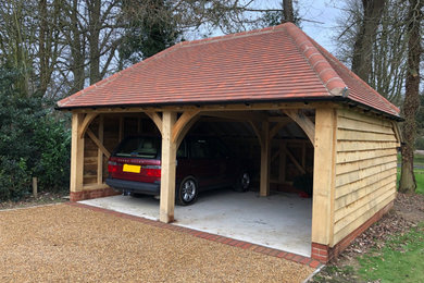 This is an example of a medium sized classic garage in Essex.