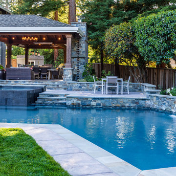 a Loggia with an Outdoor Kitchen and Living Room