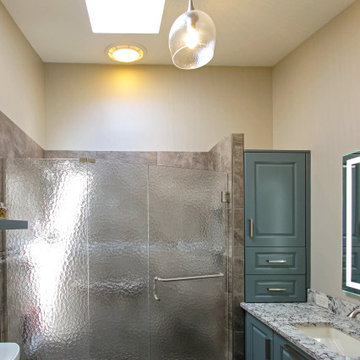 Small Masterbath with Green Cabinetry, Custom Tiled Shower and Storage