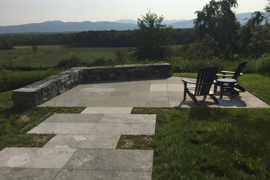 Example of a country exterior home design in Burlington