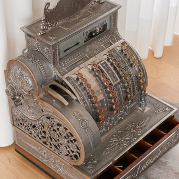 Antique Cash Register on Staircase Landing in Parede House