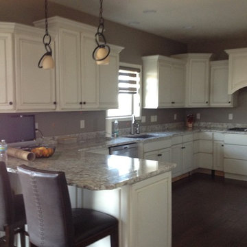 The cabinets are staggered in height for a upscale design.
