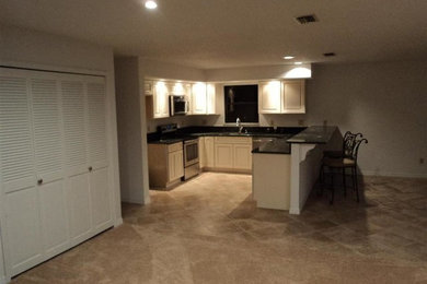 Kitchen - traditional kitchen idea in Other