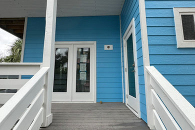 Inspiration for a tropical porch remodel in Other