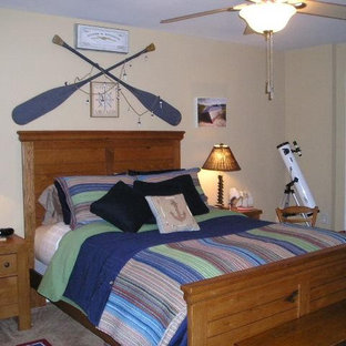 Example of an eclectic bedroom design in Charlotte