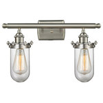 Innovations Lighting - Kingsbury 2-Light LED Bath Fixture, Brushed Satin Nickel, Glass: Clear - The Austere makes quite an impact. Its industrial vintage look transports you back in time while still offering a crisp contemporary feel. This sultry collection has a 180 degree adjustable swivel that allows for more depth of lighting when needed.