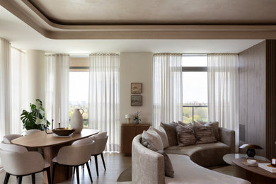 Living room - mid-sized contemporary open concept medium tone wood floor, brown floor, tray ceiling and wall paneling living room idea in Toronto with beige walls