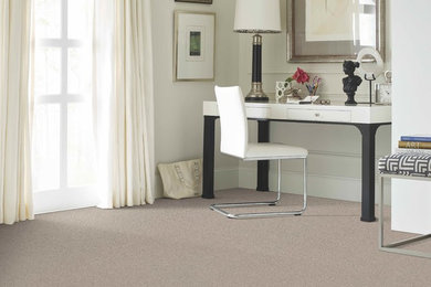 Example of a trendy home office design in Raleigh