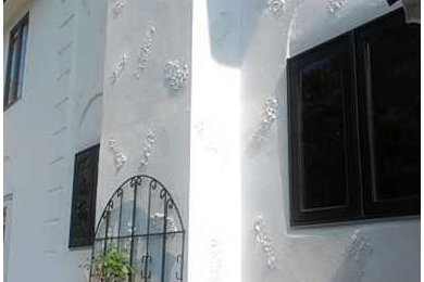 Example of a tuscan exterior home design in Other