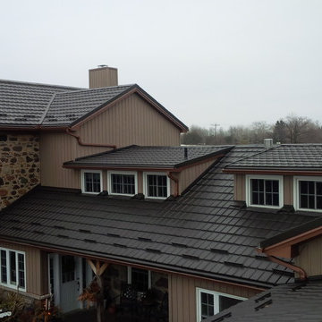 Ontario stone houses with Hy-Grade's permanent "cure" from roof shingles