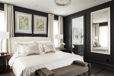 Design ideas for a mid-sized transitional master bedroom in Toronto with black walls, brown floor, dark hardwood floors and no fireplace.