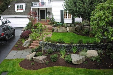 Design ideas for a large traditional full sun front yard brick garden path in Seattle.